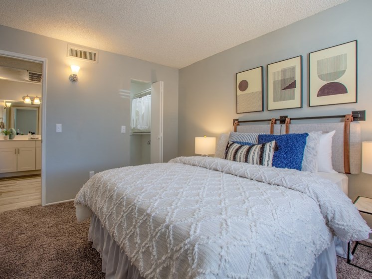 The Vintage Apartments master bedroom with attached bathroom en suite in Tucson, AZ
